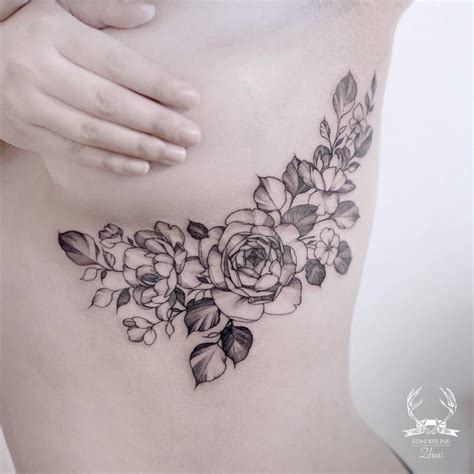 under breast tattoos for females|Beautiful Under Breast Tattoo Ideas